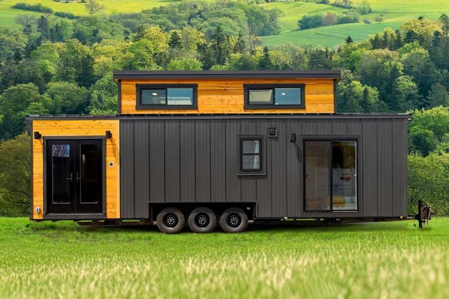 Tiny Homes for Families: Is It Possible? Family living in a cozy tiny home with bunk beds, smart storage, and shared space.